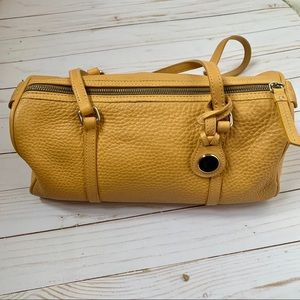 Dooney & Bourke yellow leather barrel purse